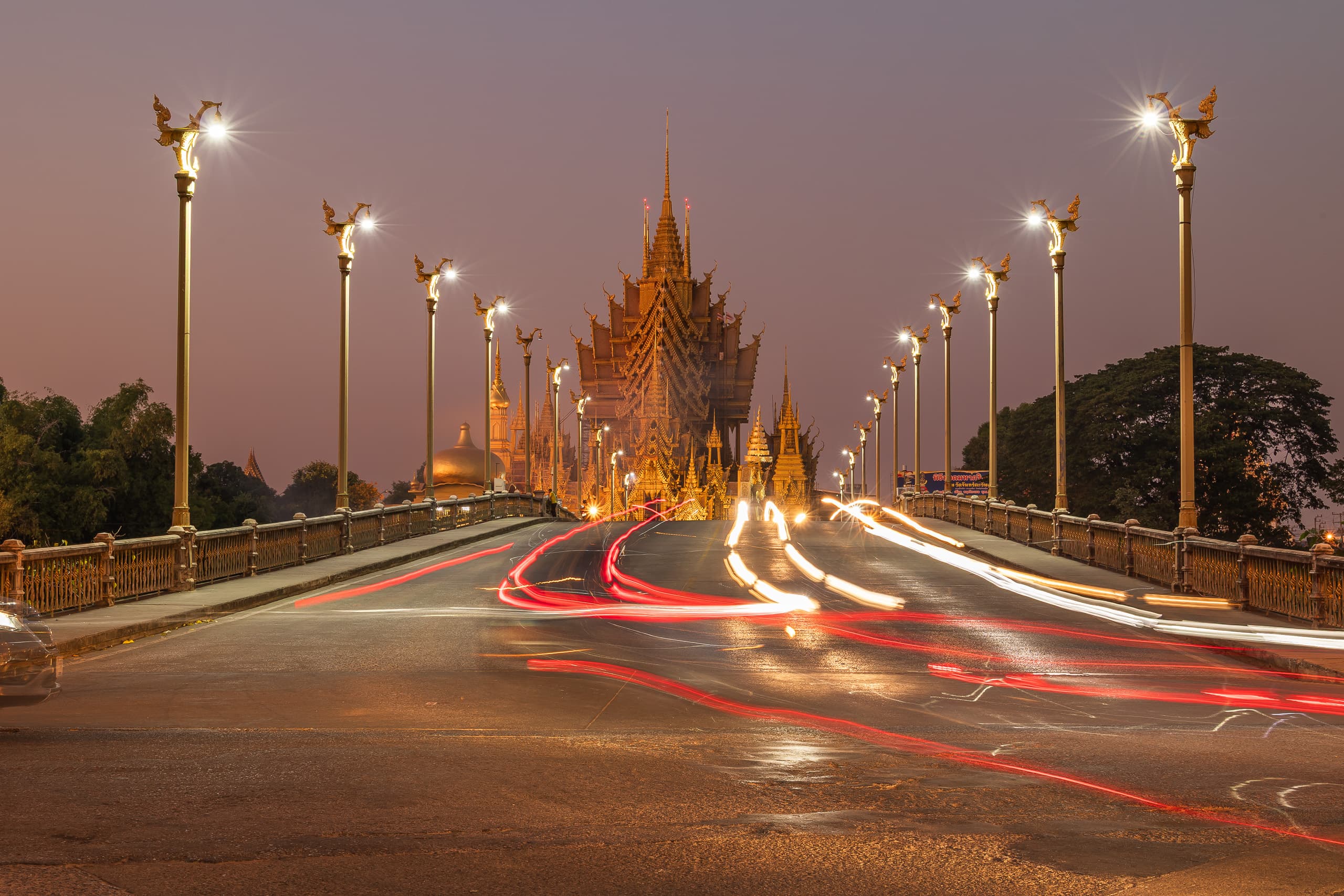 Temple in Thailand at dusk, photographed with light trails